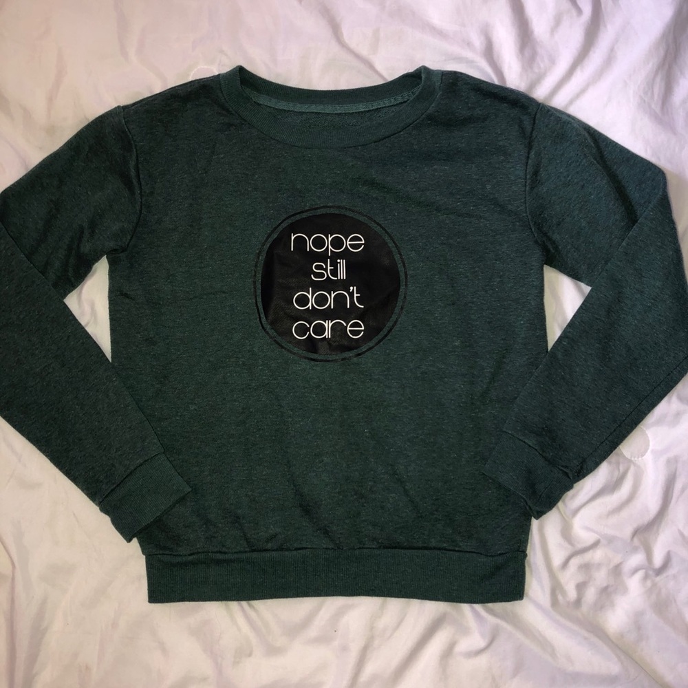 Green “Nope Still Don’t Care” sweatshirt